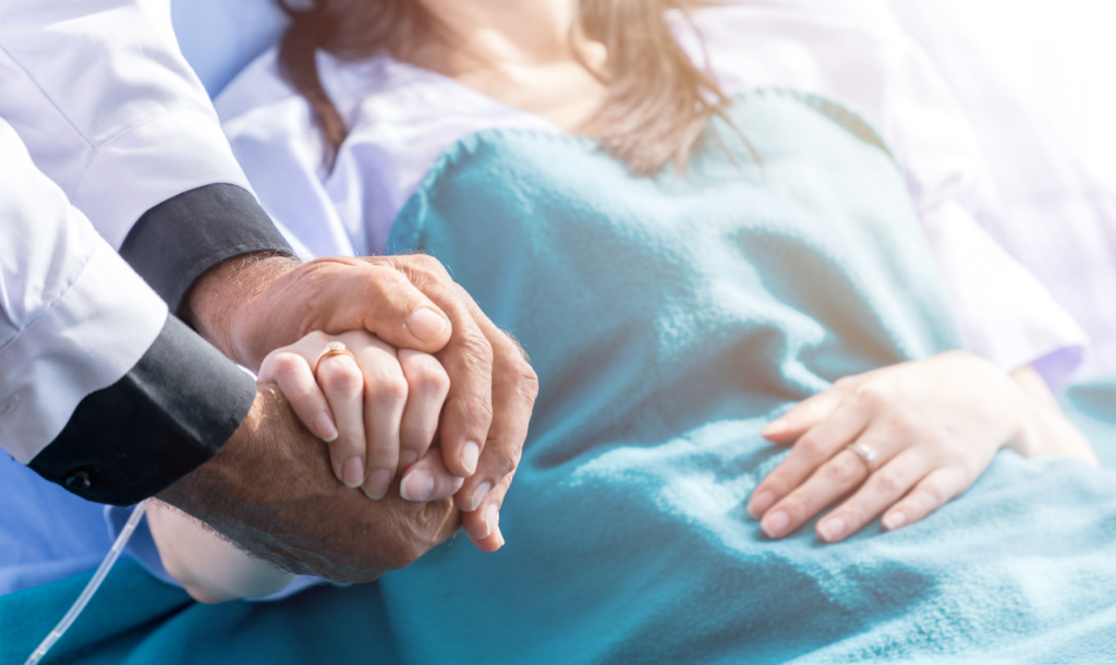 a man and woman holding hands