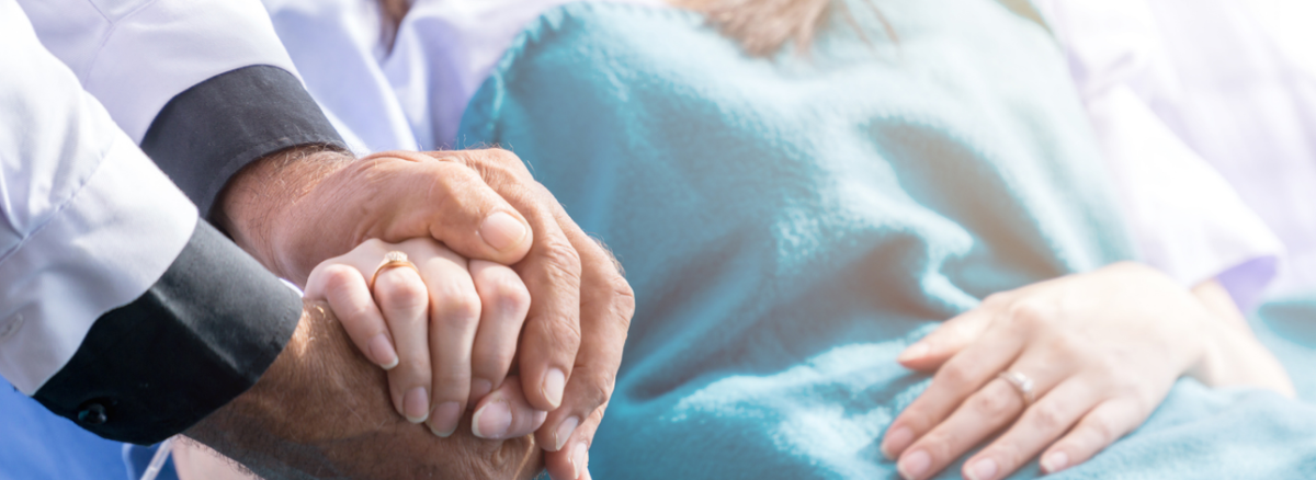 a man and woman holding hands